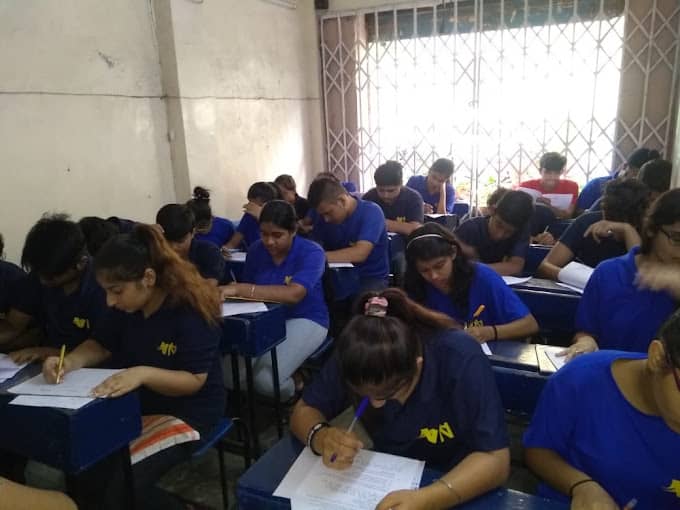 Vidya Niketan Open School Ramesh Nagar, West Delhi students writing pre board exam paper